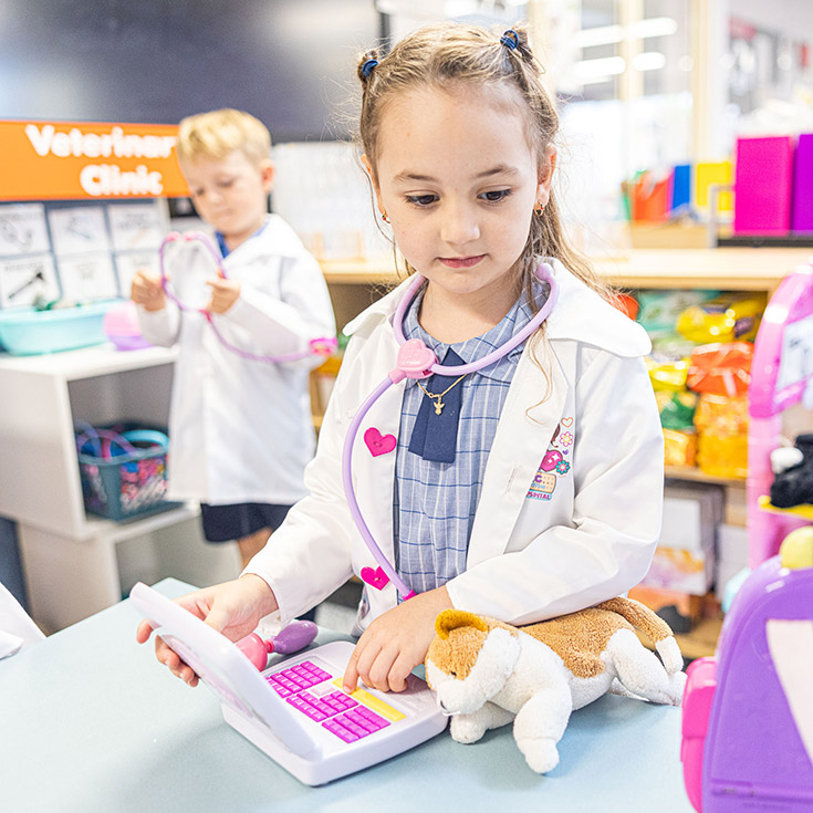 Girl being a VET at Holy Family Catholic Primary Luddenham