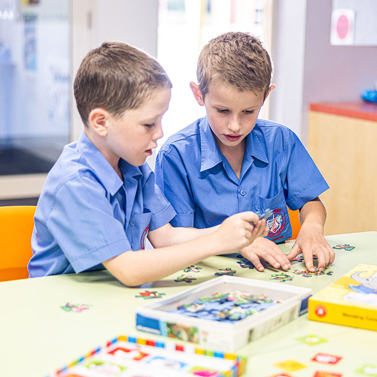 2 boys learning at Holy Family Catholic Primary Luddenham